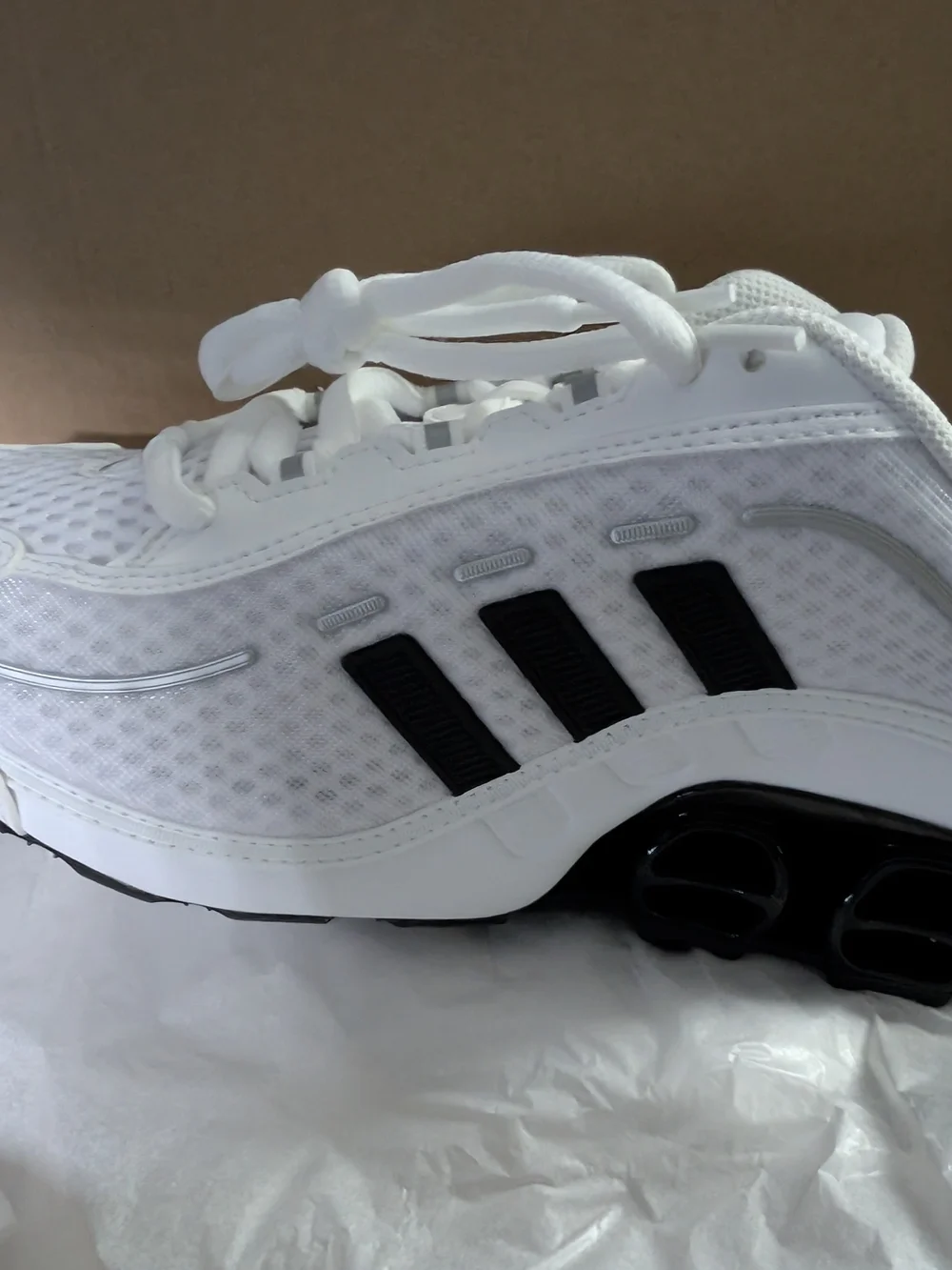 Adidas White Athletic Sneakers with Black Stripes